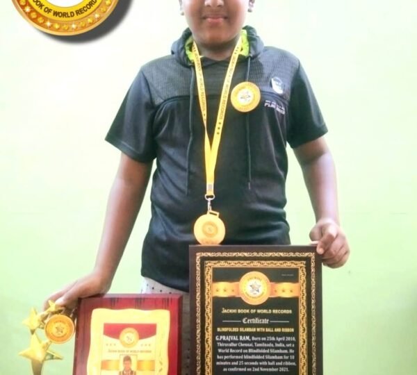 BLINDFOLDED SILAMBAM WITH BALL AND RIBBON