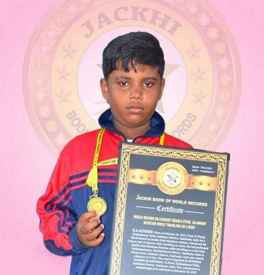 WORLD RECORD ON LONGEST  DOUBLE-HANDED  SILAMBAM ROTATION WHILE TRAVELING ON A BOAT