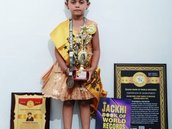 SIBLINGS MADE A GIANT RANGOLI TO EMPHASIZE EVERYONE SHOULD VOTE